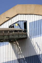 Image du Maroc Professionnelle de  Hangars de stock des engrais à l'Usine Jorf Lasfar du Groupe OCP de L'Office chérifien des phosphates. Le Groupe OCP : Société anonyme fondée en 1920 et domiciliée au Maroc. Groupe OCP est le leader mondial des exportations des phosphates et produits dérivés, Vendredi 14 Septembre 2007. (Photo / Abdeljalil Bounhar)